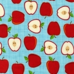 Tissu Metro Market pommes fond bleu 20x110 cm