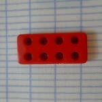 Bouton domino lego 8 trous rouge