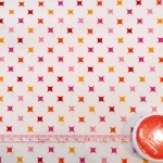 Tissu Diamants rose / orange / rouge