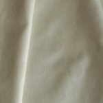 Tissu pois frappés fond beige