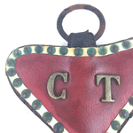 Médaille coeur cuir vintage et durable brocup