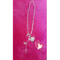 Collier clin d'oeil aux couturiers argent