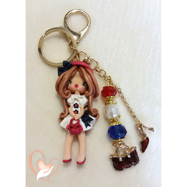 Porte clés ou bijou de sac poupée blanche et rouge - au coeur des arts