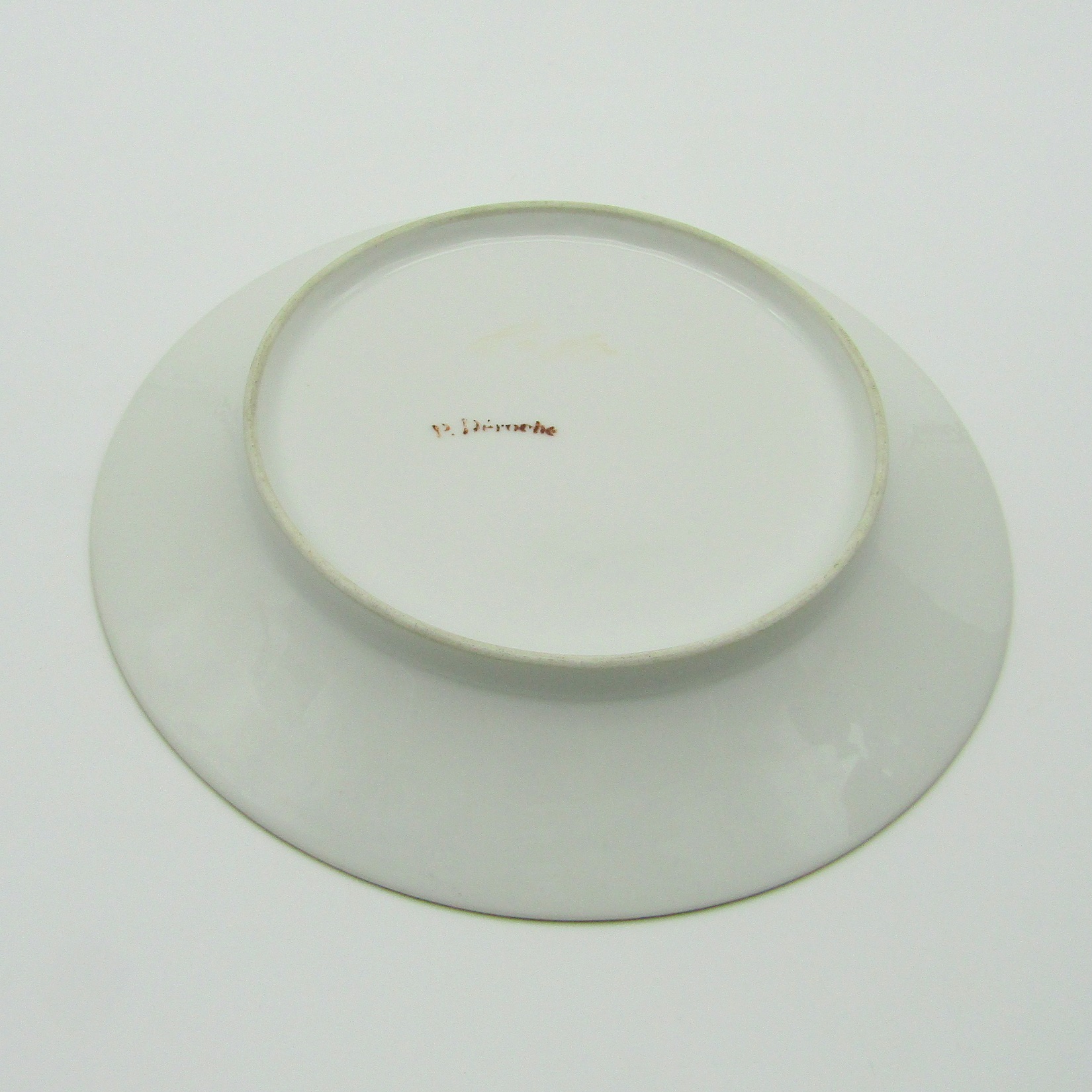 Paris. P. Déroche. Assiette en porcelaine à décor de motifs stylisés, début XIXe