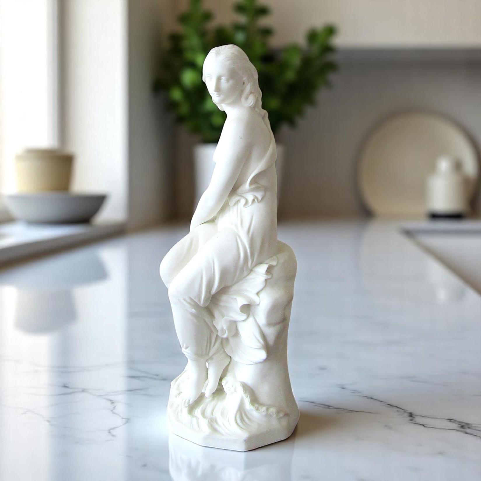 Minton. John Bell. Miranda. Figure en biscuit représentant une femme sur un rocher, XIXe siècle