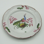 Lunéville ou Les Islettes. Assiette en faïence à décor d'un paon, XVIII-XIXe siècle