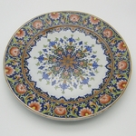Desvres. Fourmaintraux. Plat en faïence décor polychrome d'une rosace, XIXe siècle