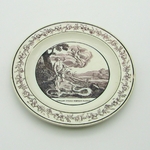 Montereau. Assiette en faïence fine Apollon tue le serpent Python, XIXe siècle