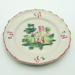 Moustiers ou Varages. Assiette en faïence à décor de deux personnages dans un paysage, XVIIIe siècle