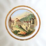 KPM Berlin. Tasse en porcelaine à décor polychrome de paysages, début XXe siècle