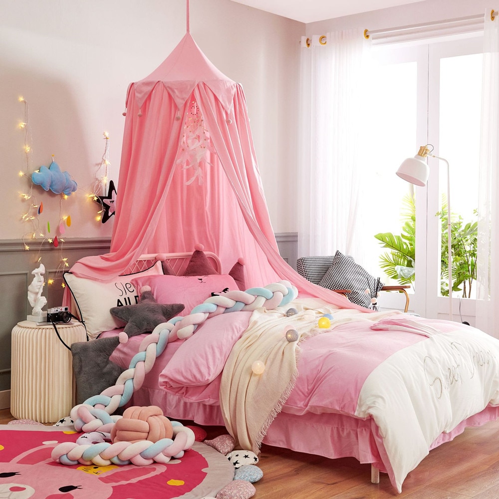 chambre bébé ciel de lit rose