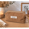 Trousse en velours marron côtelé