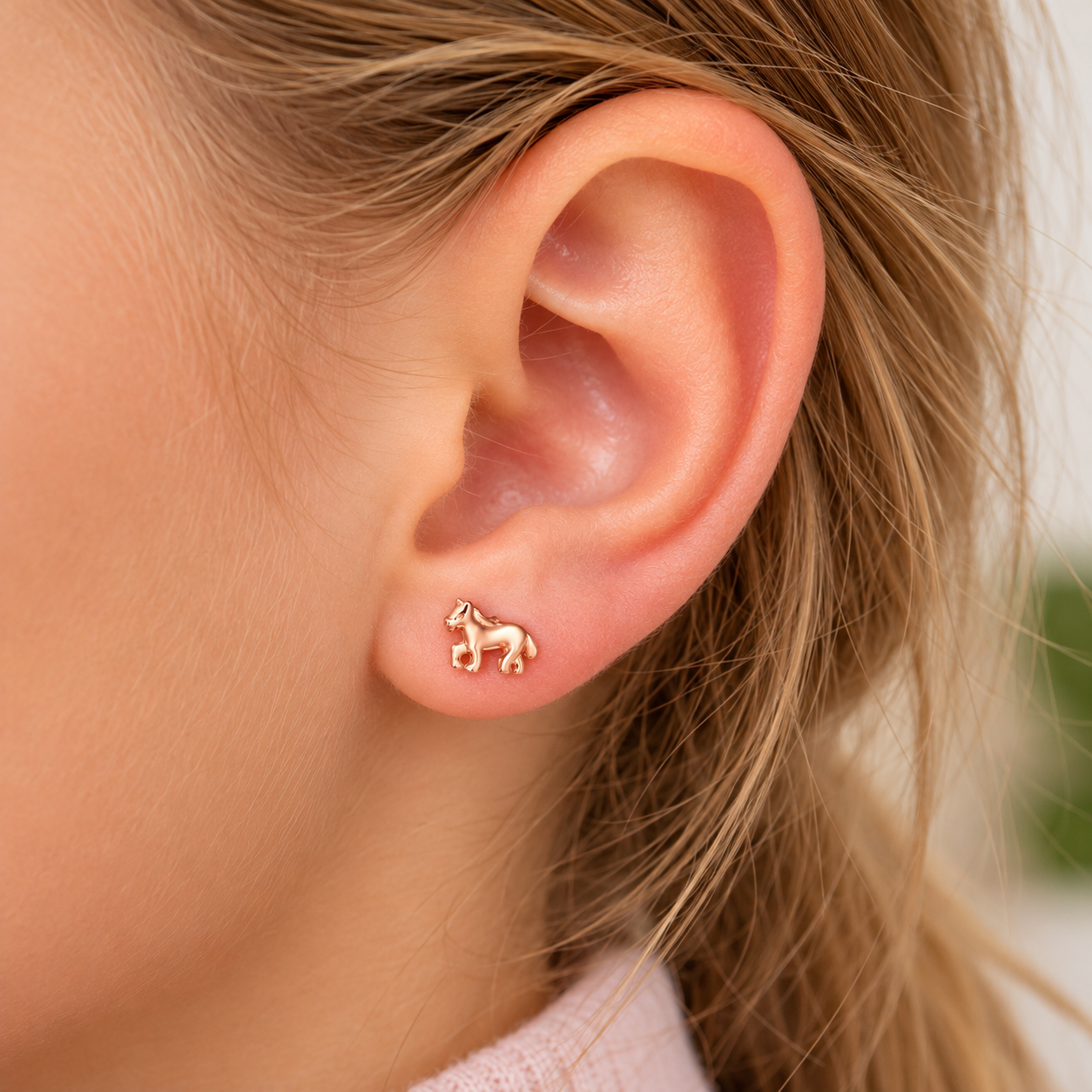 Boucle d’oreille cheval en or rose
