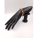 bracelet-signe-de-paix-style-boheme-resine-orange-soie-noir-perle-argent