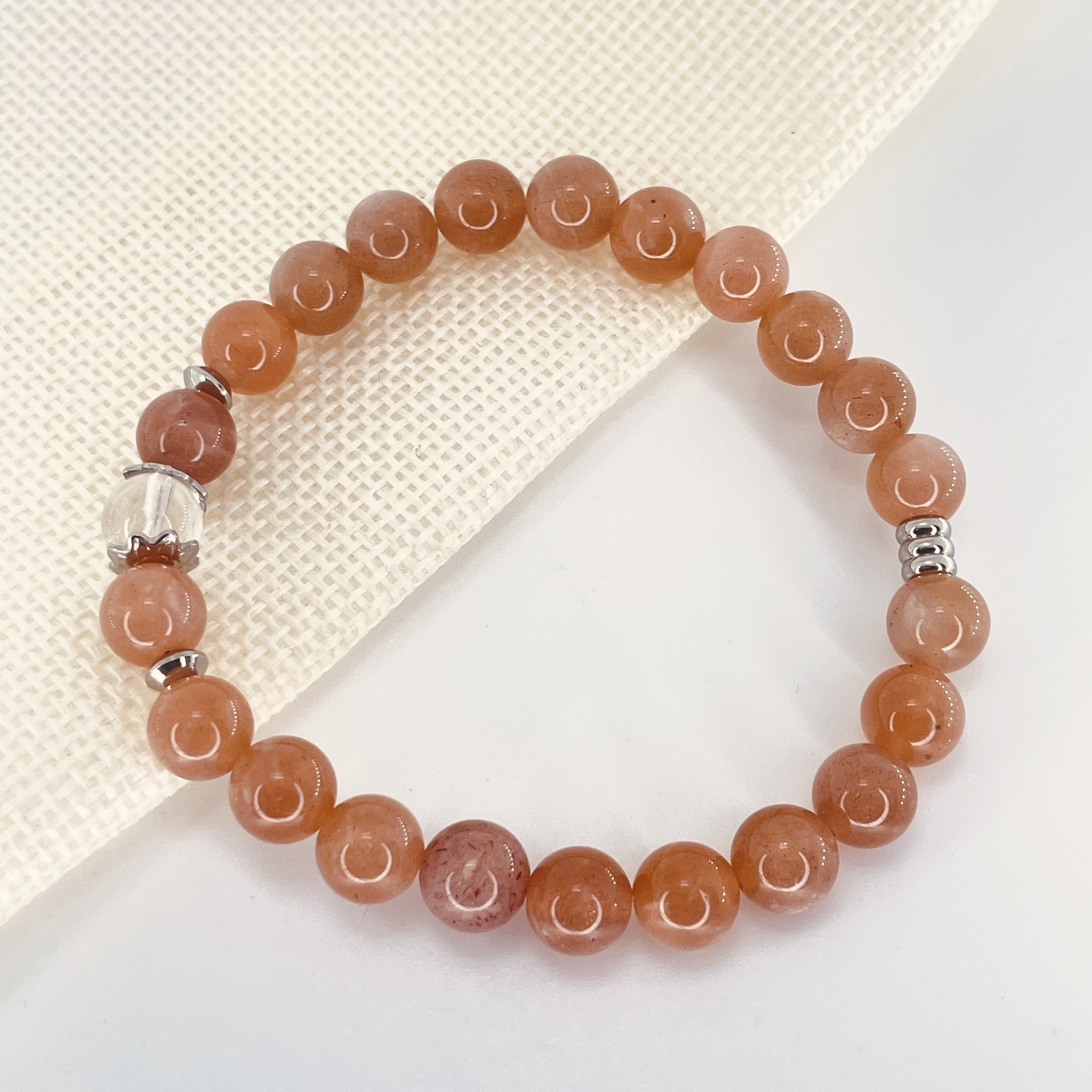 Bracelet Pierre de Soleil en pierre naturelle perles 8 mm avec perle de Quartz blanc et acier
