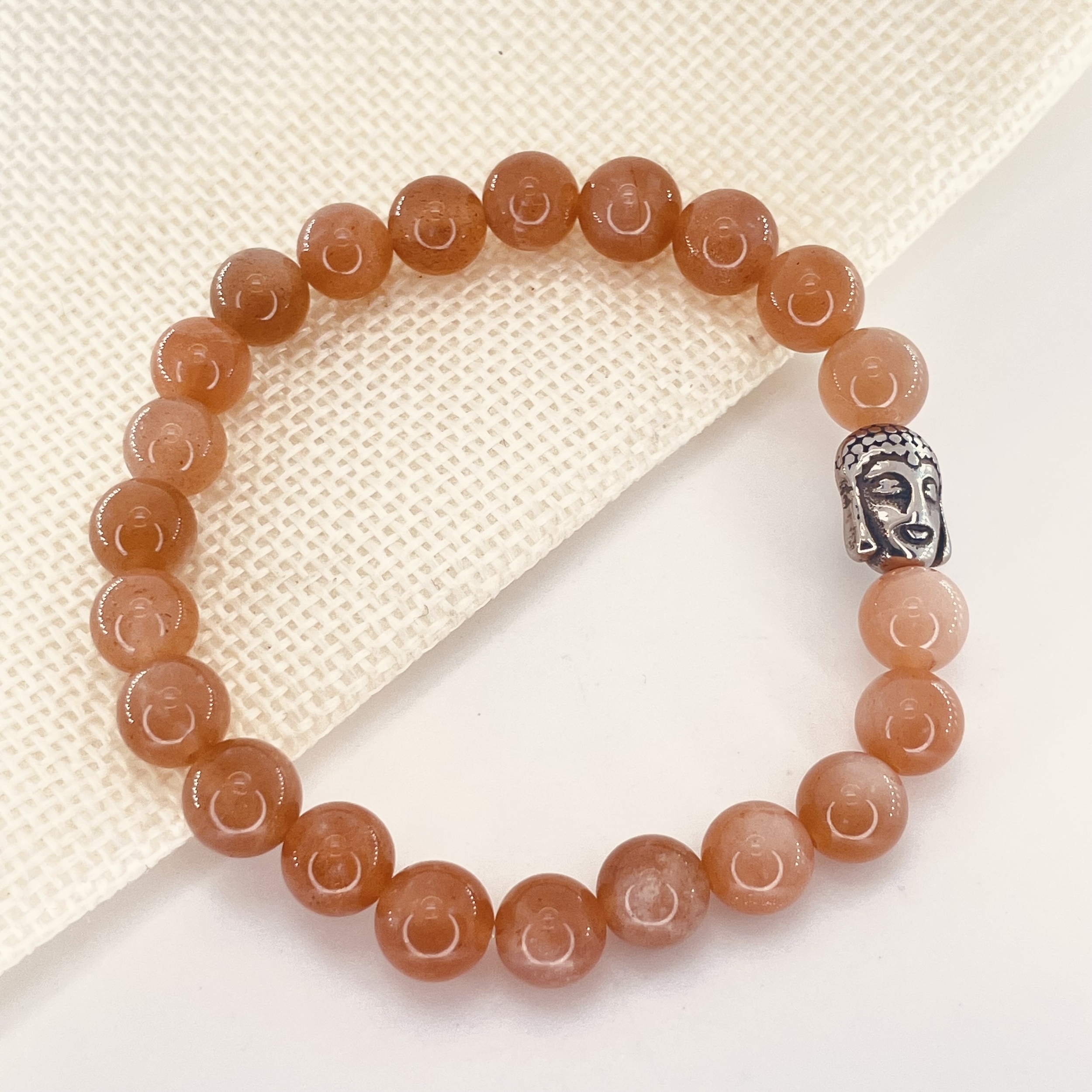 Bracelet perles Pierre de soleil en pierre naturelle avec tête de Bouddha