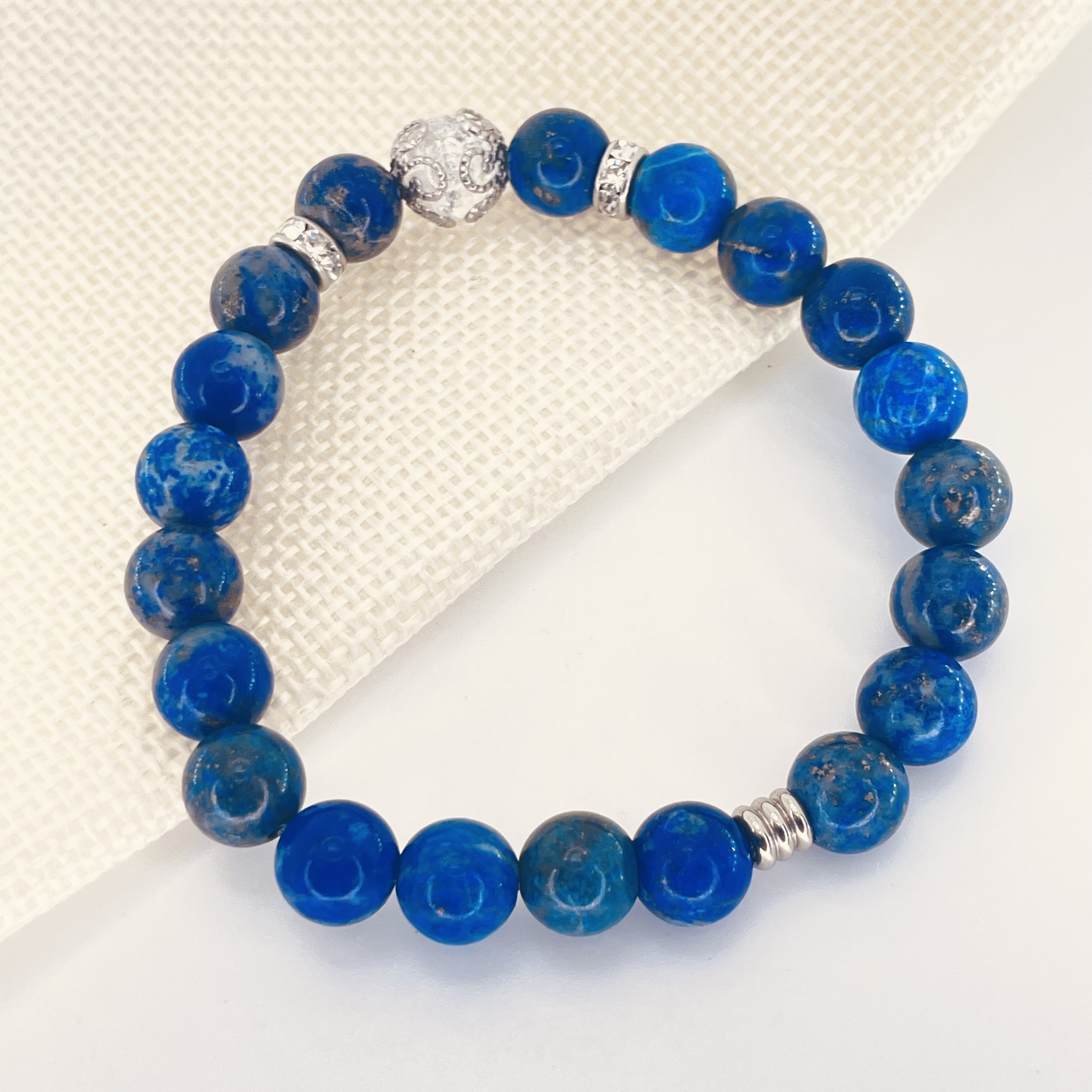 Bracelet perles 8mm Lapis Lazuli avec perles de quartz craquelé, strass et acier