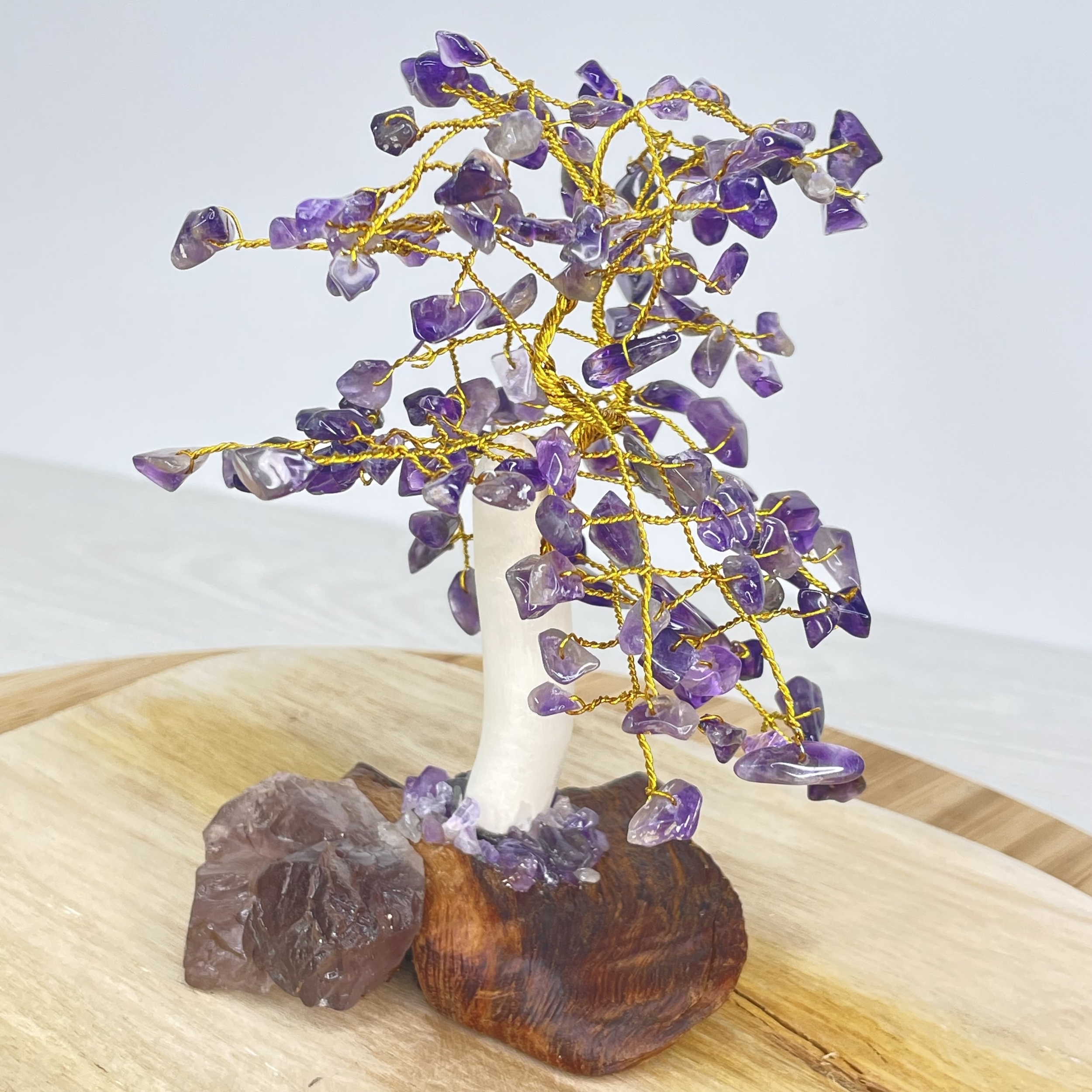 Arbre de vie en Amethyste avec pied en bois modèle 13cm de haut environ