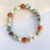 ESSENCE-DE-JOIE-CHRYSOPRASE-CALCITE-ORANGE-PIERRES-DU-MONDE-VOSGES