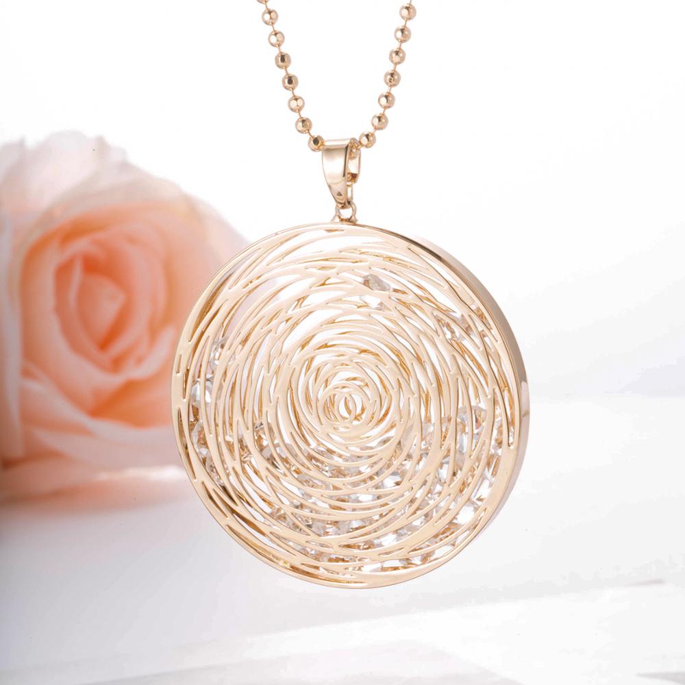 grand pendentif doré avec strass à lintérieur