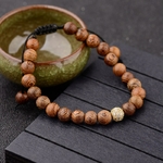 Bracelet perles de bois strass