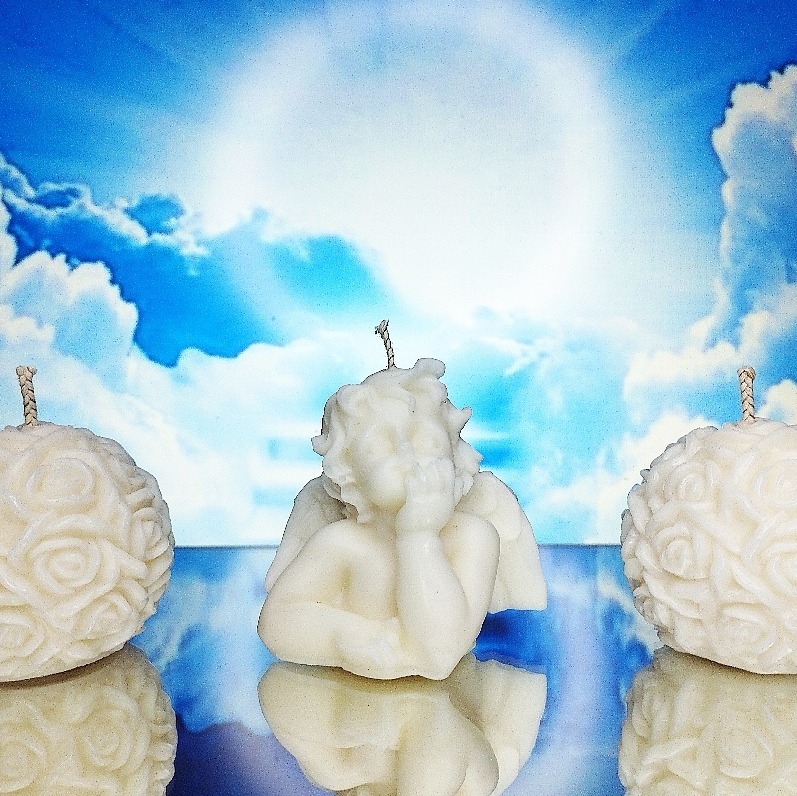 Bougie Ange et boules de roses