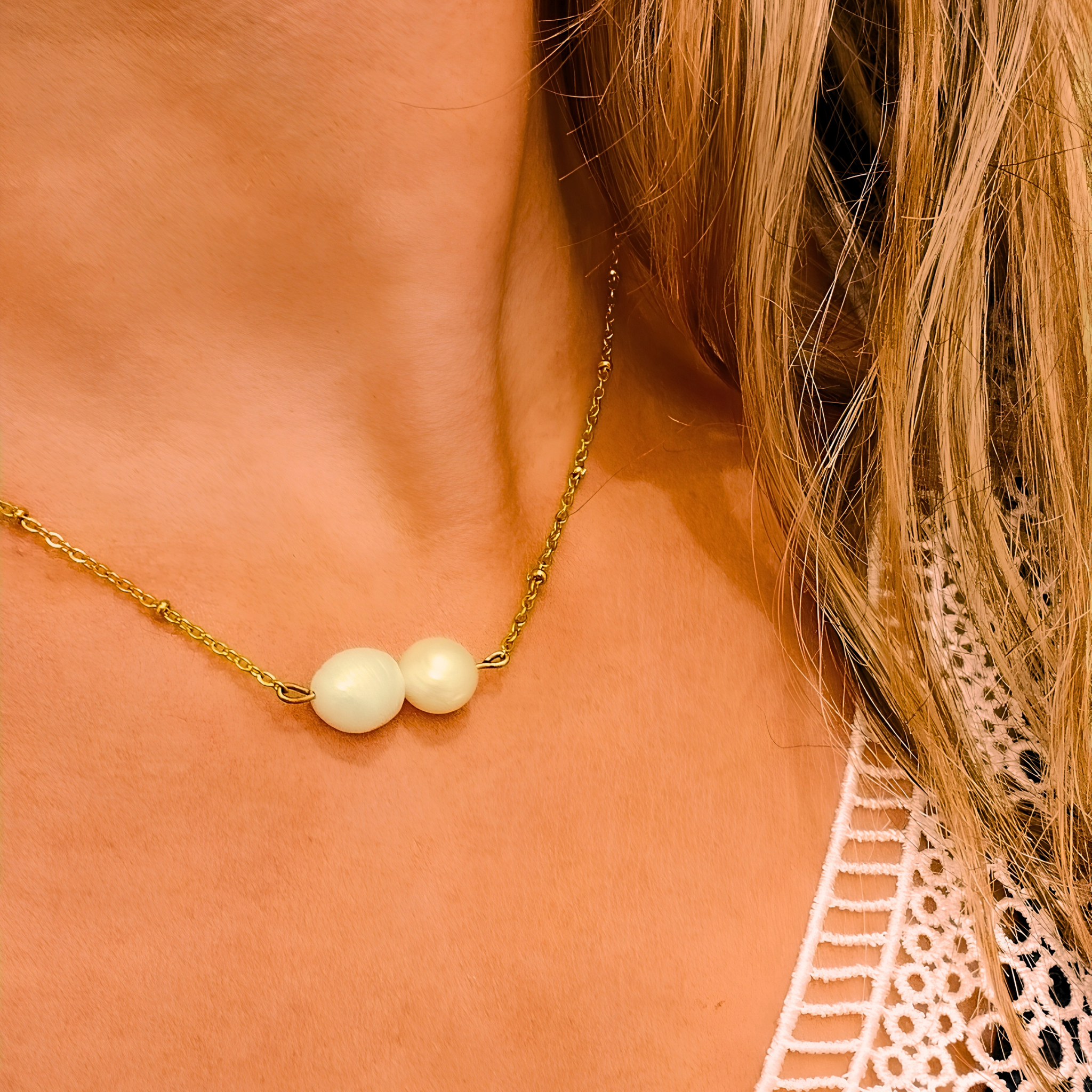 Collier acier inoxydable et deux perles deau douce