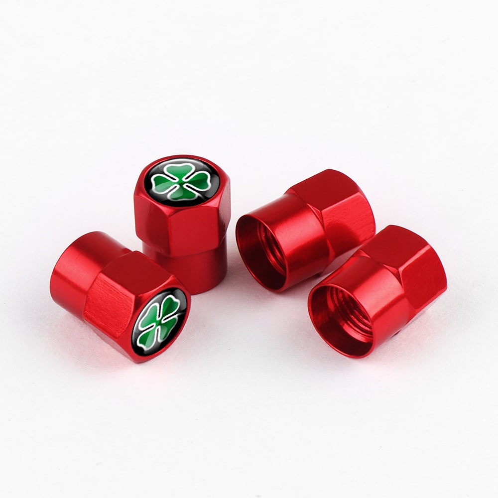 Quadrigoglio couvercles de valve rouges, pack de quatre sur fond blanc