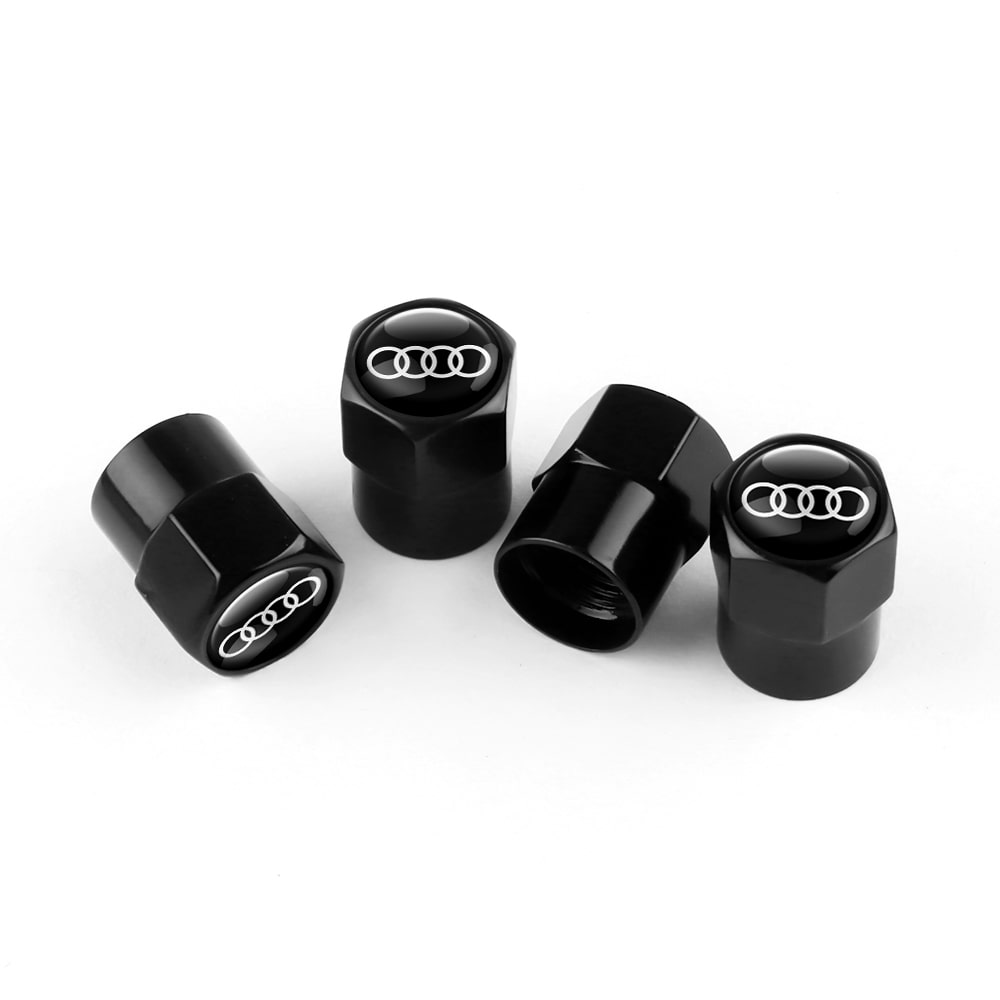 Lot de 4 bouchons de valve noirs avec logo Audi sur fond blanc, compatibles avec toutes les voitures