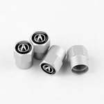 Lot de 4 bouchons de valve argentés ACURA sur fond blanc