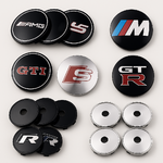 Ensemble de caches-moyeux sport racing noirs et métallisés, présentant plusieurs designs agressifs et finitions dynamiques pour jantes de voiture
