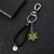 porte cles one piece cuir logo traflagar law