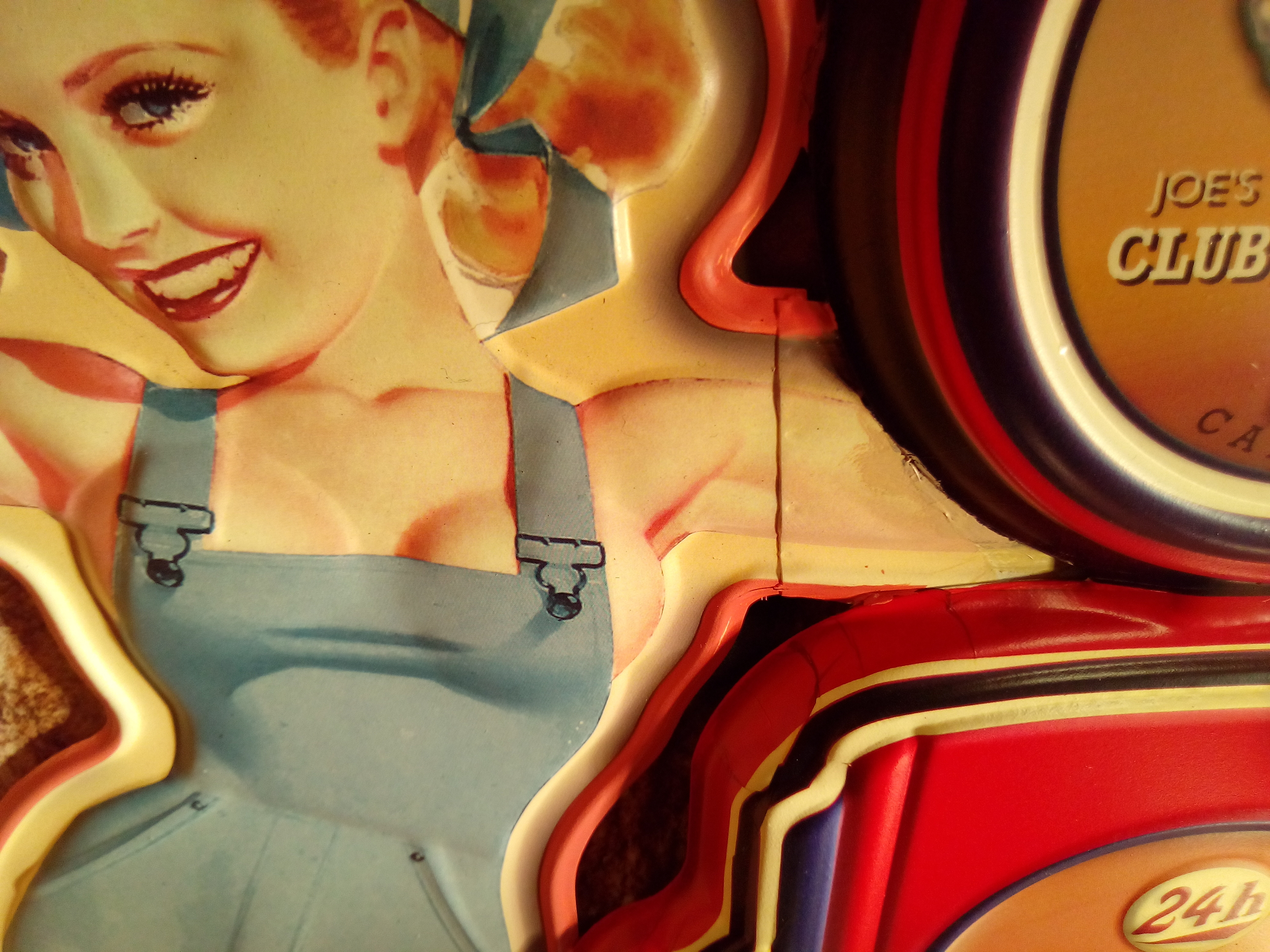 Plaque pin-up pompiste vintage