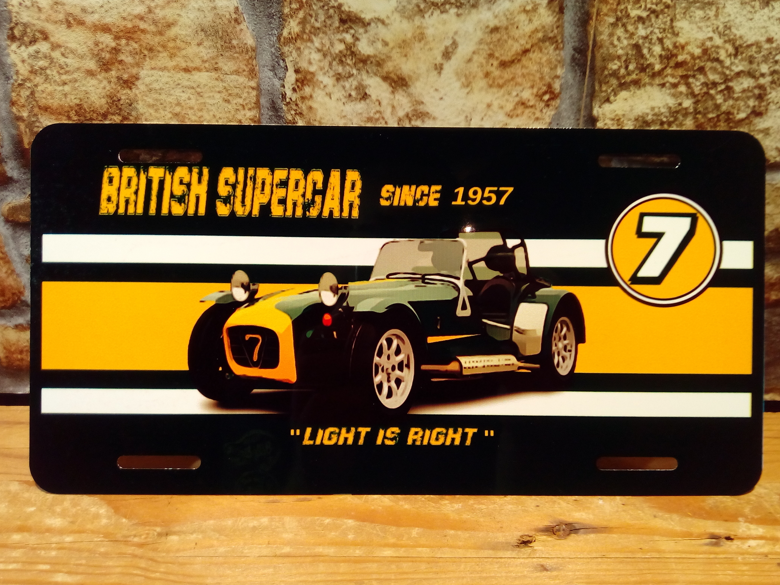 plaque métal lotus seven 30x15cm