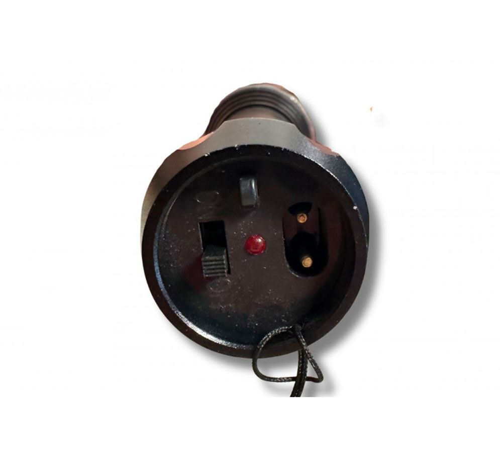 Culot de la lampe shocker : interrupteur, témoin rouge, bouton et prise de charge à deux broches