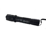 Lampe shocker noire vue de profil, bouton sur le corps et plaquette Flashlight sur le manche quadrillé