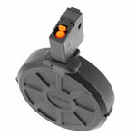 Tête du chargeur tambour T4E vue de dessus, poussoir orange visible