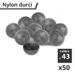 Dix billes en nylon durci gris chiné, calibre .43, dont une coupée en deux