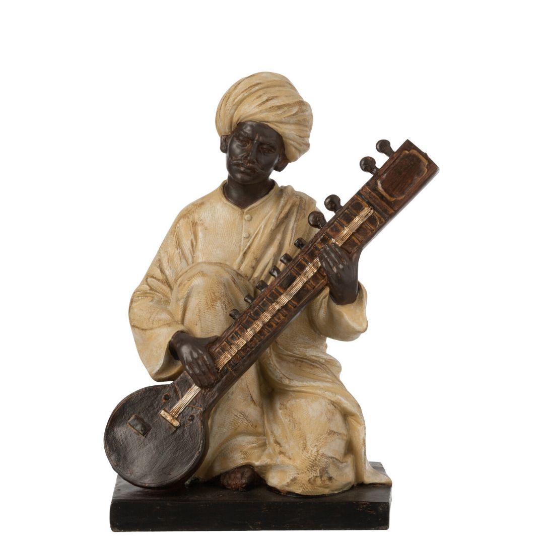 Statue indienne avec instrument de musique