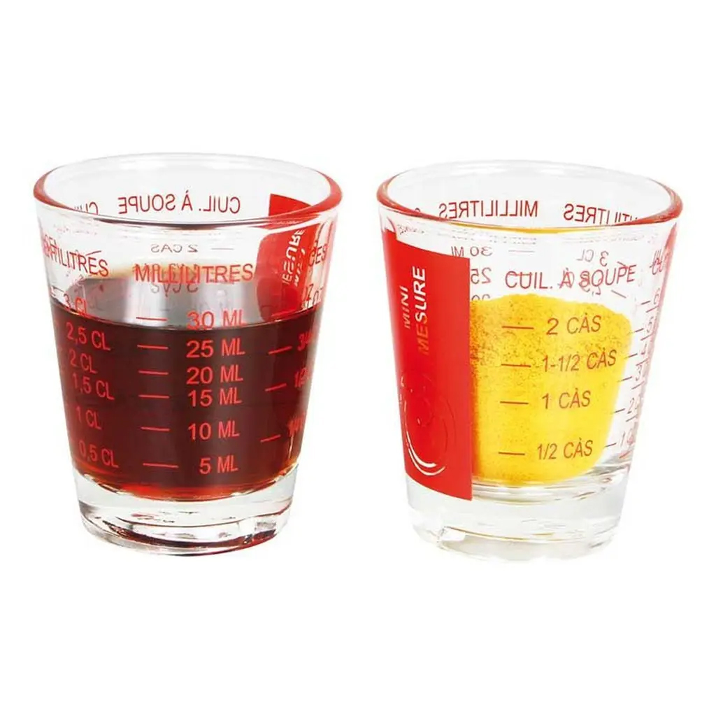 De lhuile et du vinaigre dans deux verres doseurs