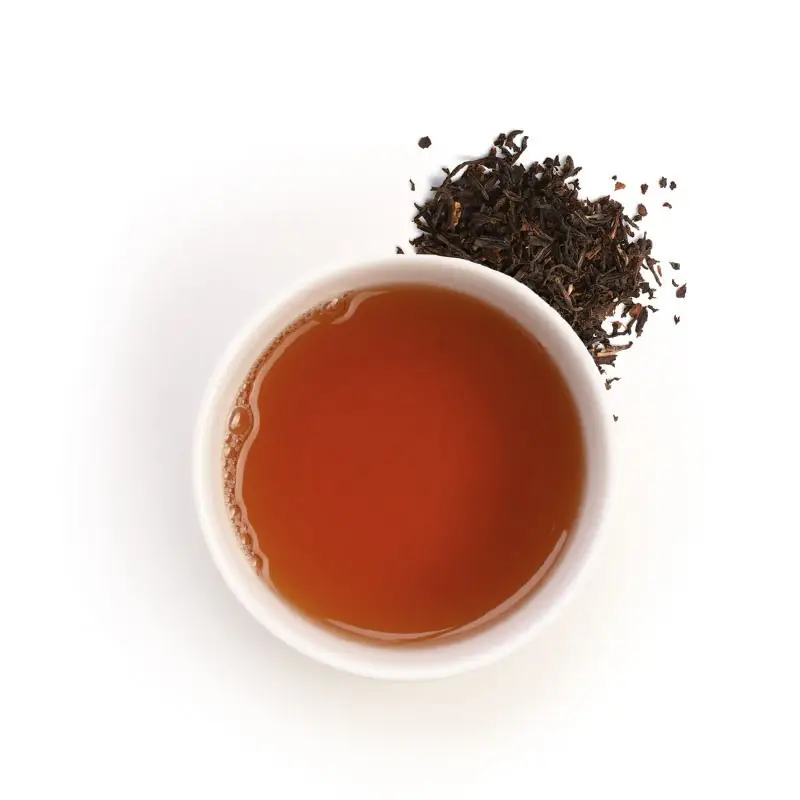 Une tasse de thé et du thé