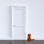 Cale porte en forme de chat devant une porte