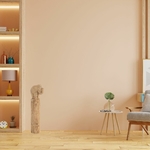 Décoration de salon avec bibliothèque, une chaise, une table et un éléphant sur une colonne
