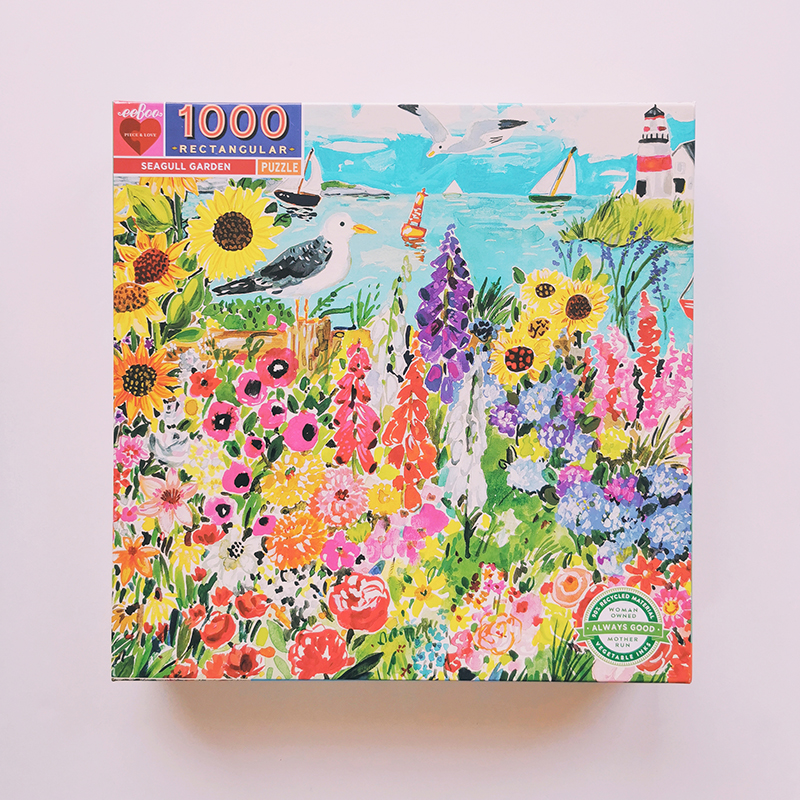 puzzle 1000 pièces enfant et adulte goéland et jardin de fleurs colorées eeboo
