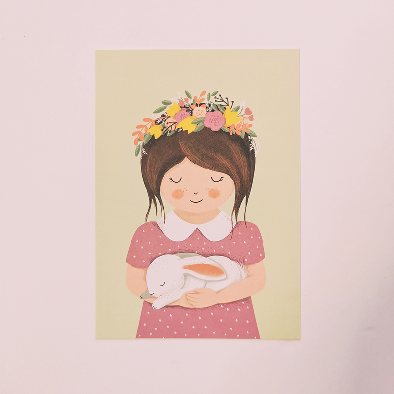 Carte postale jeune fille avec un lapin