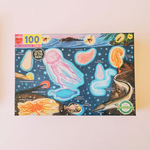 puzzle 100 pièces pour enfant qui brille dans la nuit bioluminescent eeboo