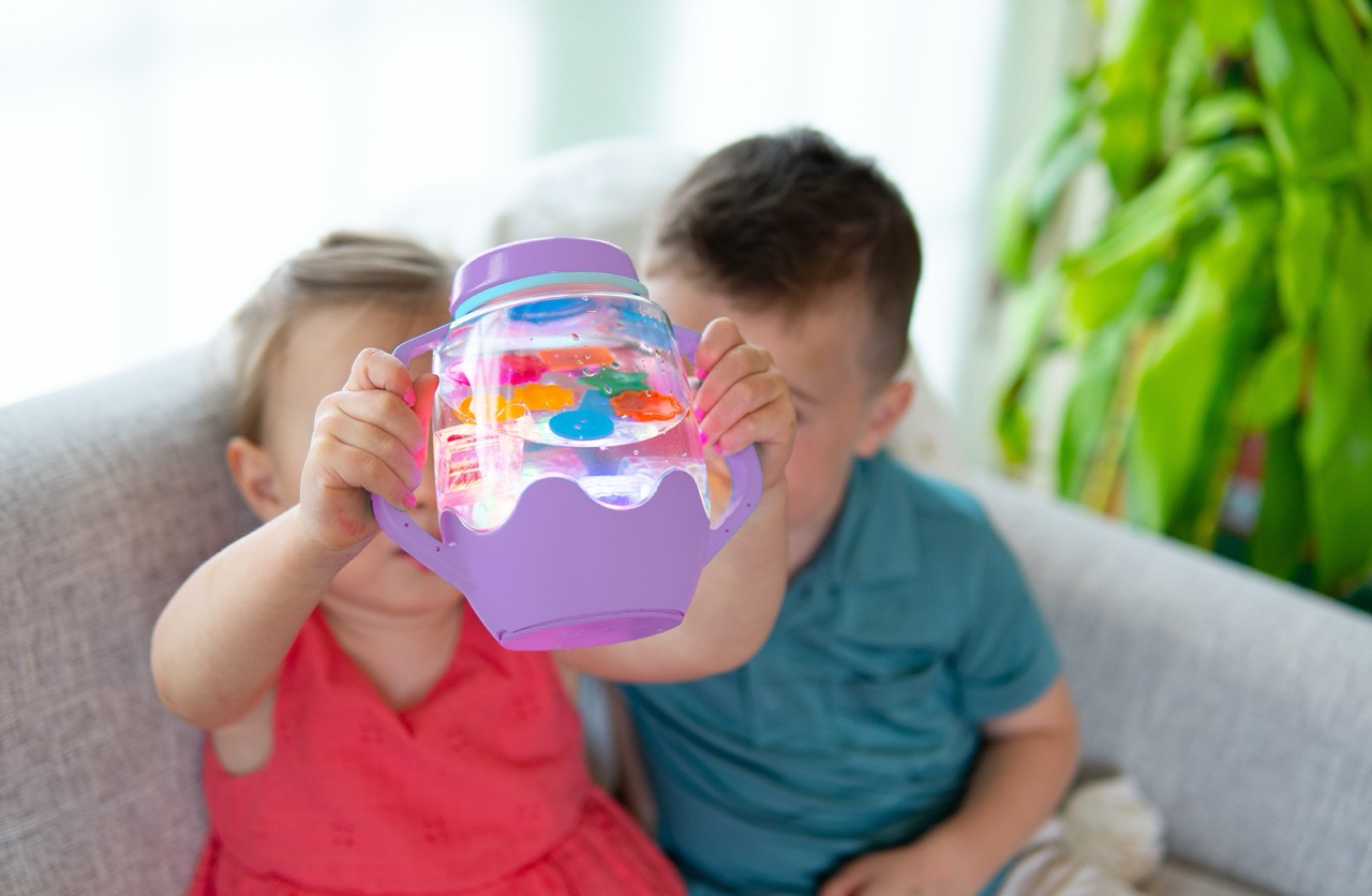 Bouteille de jeu sensoriel à remplir Glo Pals Violet3 - Grande