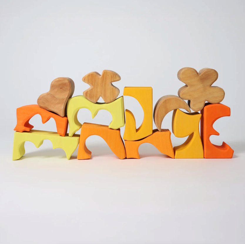 Jeu de construction puzzle formes jaune Grimms1