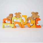 Jeu de construction puzzle formes jaune Grimms1