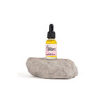 Sérum intime hydratant Fem Drops Secret Play 15ml, soin naturel pour lhydratation de la zone intime féminine avec aloe vera, calendula et jojoba, ooh my god, photo du flacon sur une pierre